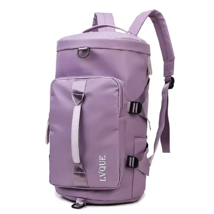 Waterproof duffle bag in purple design with padded straps and top handle for hiking or daily carry.