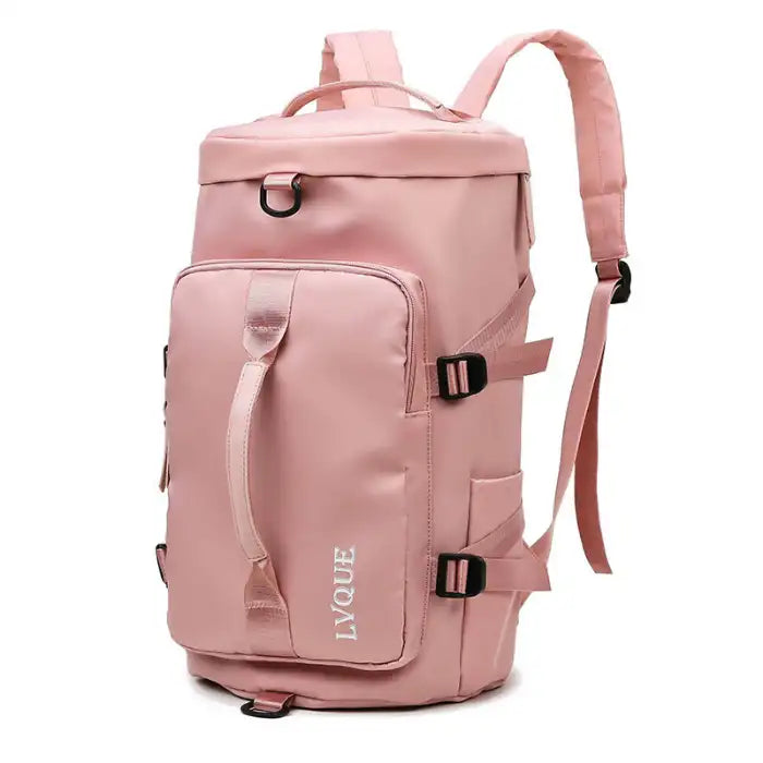Waterproof soft pink duffle bag featuring dual carry handles, side pockets, and buckle strap detailing.