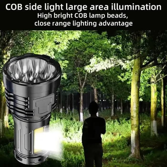 Waterproof flash light with COB side light illuminating forest for wide area coverage at night.