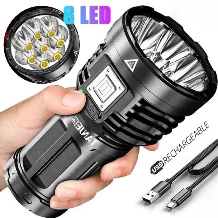 Waterproof flash light with 8 LED bulbs, USB rechargeable, rugged design for outdoor use.