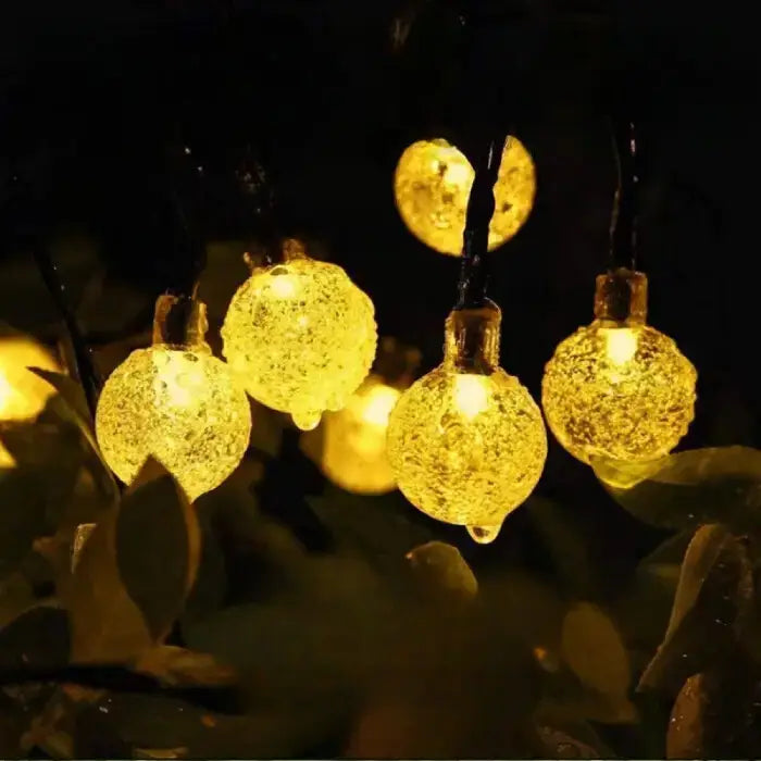 Glowing crystal ball lights with waterproof rating, perfect for outdoor decor in gardens, patios, and events