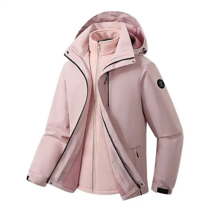 Waterproof windproof softshell jacket with fleece liner in pink, side view showing zipper and hood details.