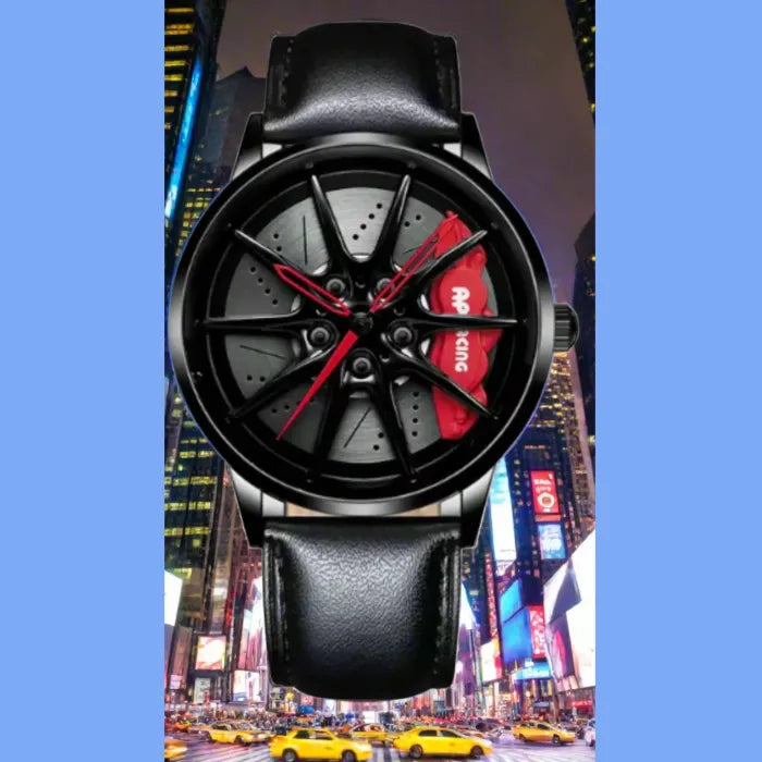 Elegant black watch with wheel-inspired dial design, red accents, and perforated details on a leather strap