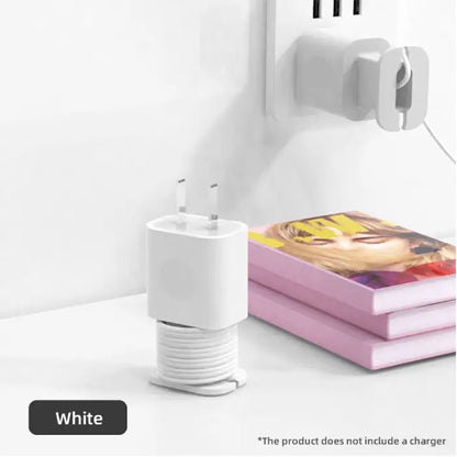 White charger cord organizer designed for clean and compact cable storage on desks or countertops.