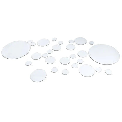 Set of round mirror stickers in various sizes arranged in a scattered pattern on a white background for wall decoration.