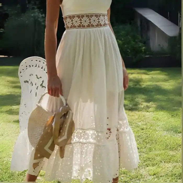 White lace midi dress with lace waist panel paired with woven basket bag.