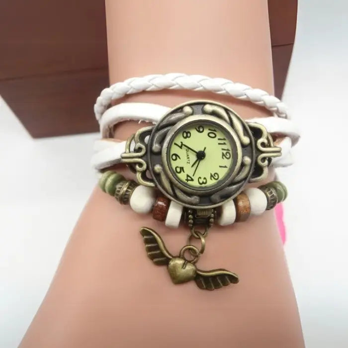 White leather bracelet watch with vintage charm, beads, and boho-chic design for women’s casual fashion.