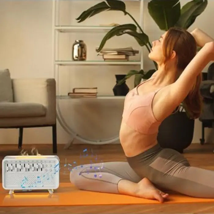 White noise speaker playing calming sounds during a yoga session with woman stretching indoors.