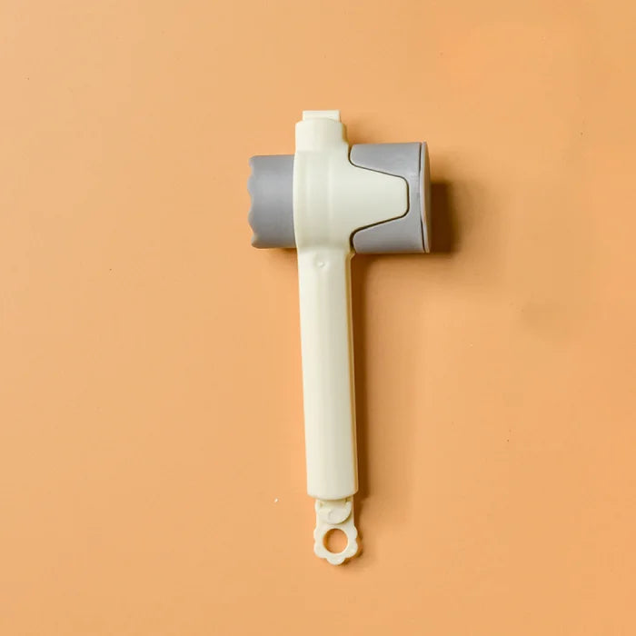 white handle and gray cap sealing clip used to preserve food and liquids items