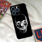 White sketch skull phone case with minimalist line art on a black background, simple and striking.