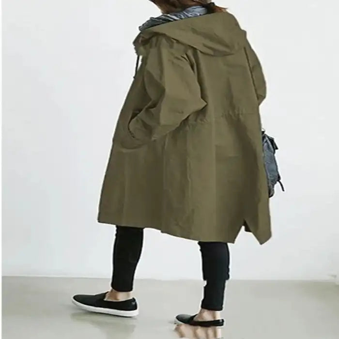 Windbreaker Trench Coat in army green shown from back with hood and side pockets.