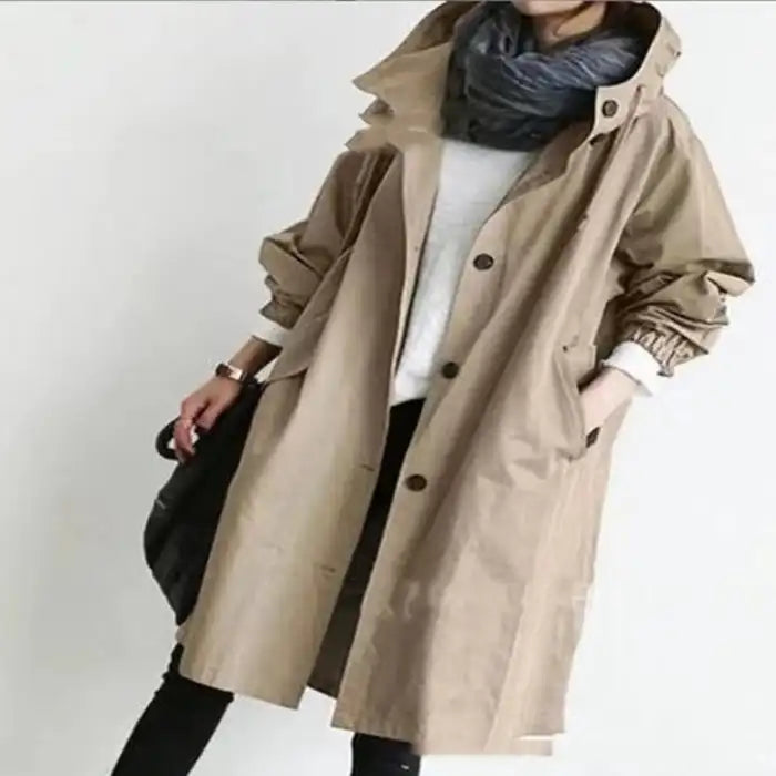 Windbreaker Trench Coat in khaki with button-up design and pockets styled with casual wear.