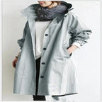 Windbreaker Trench Coat in light blue with button closure, styled casually with scarf and leggings.