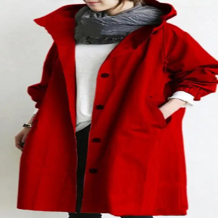 Windbreaker Trench Coat in vibrant red paired with neutral outfit and soft scarf.