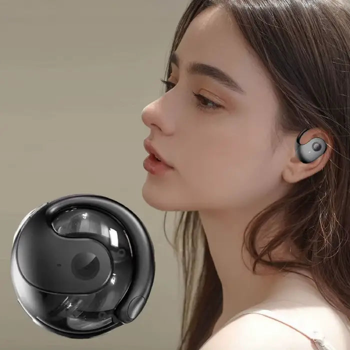 Black wireless earbud and charging case shown in lifestyle portrait against neutral background