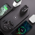 Wireless fast charging station top view with phone, smartwatch, and earbuds around dock