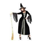 Witch Halloween costume with broomstick and flowing black gown.