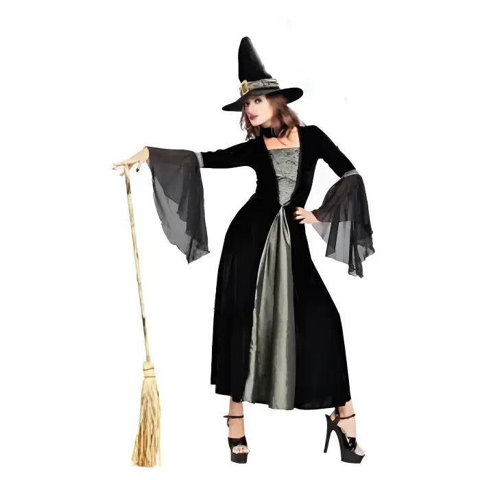 Witch Halloween costume with broomstick and flowing black gown.