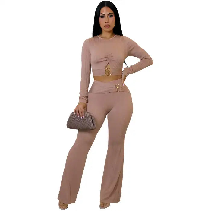 women two piece set beige ribbed long sleeve ruched crop top with ring detail and high waist wide leg pants front.