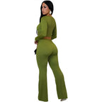 women two piece set olive ribbed knit shown from back highlighting high waist wide leg pants and fitted long sleeve top.