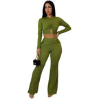 women two piece set olive ribbed long sleeve ruched crop top with ring detail and high waist wide leg pants front view.