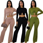 women two piece set ribbed long sleeve crop top with ring detail and high waist wide leg pants in beige set shown.
