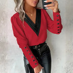 womens contrast v neck long sleeve blouse black trim in red styled with sleek leather pants for an elegant modern fashion outfit