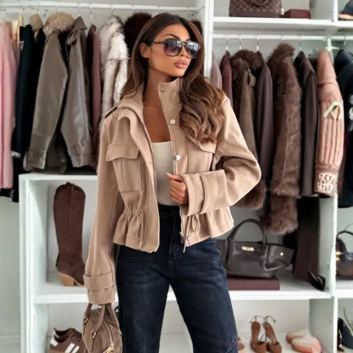 Women's cropped utility jacket in sand beige with flap pockets and cinched waist, perfect for chic daily wear today