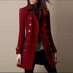 Womens double breasted wool coat in deep red featuring tailored structure and bright buttons for bold refined seasonal wear