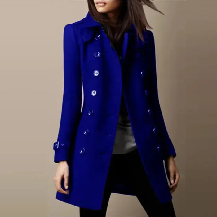 Womens double breasted wool coat in royal blue with polished buttons and tailored fit offering elegant stylish cold-season wear