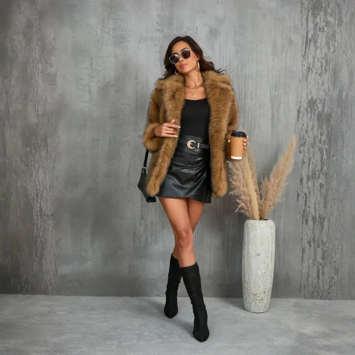 Womens Faux Fur Coat in rich brown tone styled with black skirt and boots for a timeless winter outfit with cozy warmth