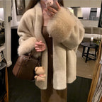 womens faux fur coat worn in a modern winter outfit featuring plush texture elegant drape and cozy warmth