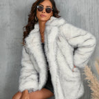Womens Faux Fur Coat close-up in soft white highlighting premium faux fur texture for warmth luxury and winter elegance