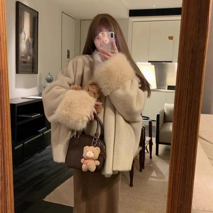 womens faux fur coat worn as a full winter look with soft texture elegant drape and fashionable cold weather comfort