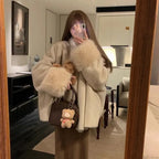 womens faux fur coat worn as a full winter look with soft texture elegant drape and fashionable cold weather comfort