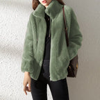 women’s faux fur jacket in light green with cozy high collar design