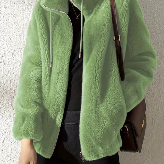 women’s faux fur jacket in light green with soft plush texture and high collar