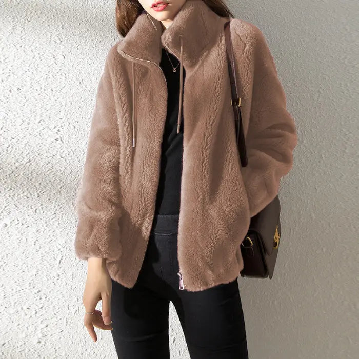 women’s faux fur jacket in taupe showcasing soft texture and relaxed fit