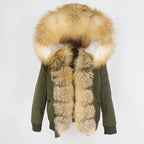 Womens fox fur parka with oversized hood in army green with golden trim, blending rugged style with luxurious warm detailing