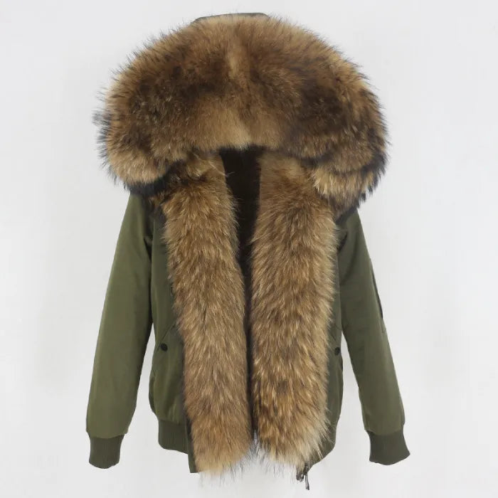 Womens fox fur parka with oversized hood in army green with natural fur, delivering rugged luxury and warm seasonal protection