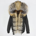 Womens fox fur parka with oversized hood in natural mixed tones, highlighting voluminous trim and warm winter appeal for style
