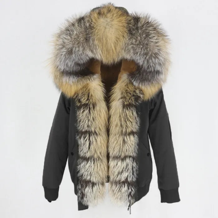 Womens fox fur parka with oversized hood in natural mixed tones, highlighting voluminous trim and warm winter appeal for style