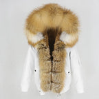 Womens fox fur parka with oversized hood in white with golden fur, providing luxe texture and warm winter comfort in stylish form
