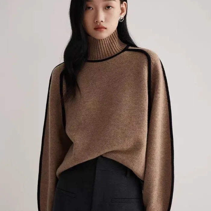 Camel Women's Half Turtleneck Sweater with black seam detailing, styled with high-waisted black pants.