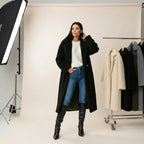 women's long oversized coat in black with structured wool finish creating a sleek versatile winter wardrobe staple