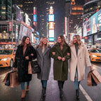 women's long oversized coat featured in city winter street style with neutral tones showing versatile fashion appeal