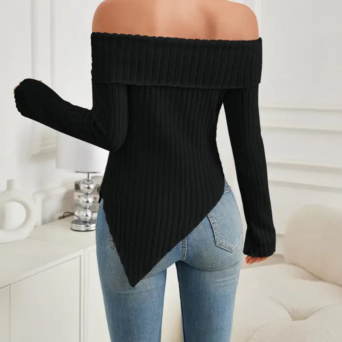 Back view of women's off shoulder knit top in black with ribbed fabric and pointed hem.