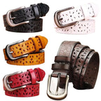 women's patterned belt in multiple colors with floral engraved design and metal buckle