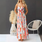 Women's printed spaghetti strap maxi dress with pockets featuring shell and starfish design and front tie.