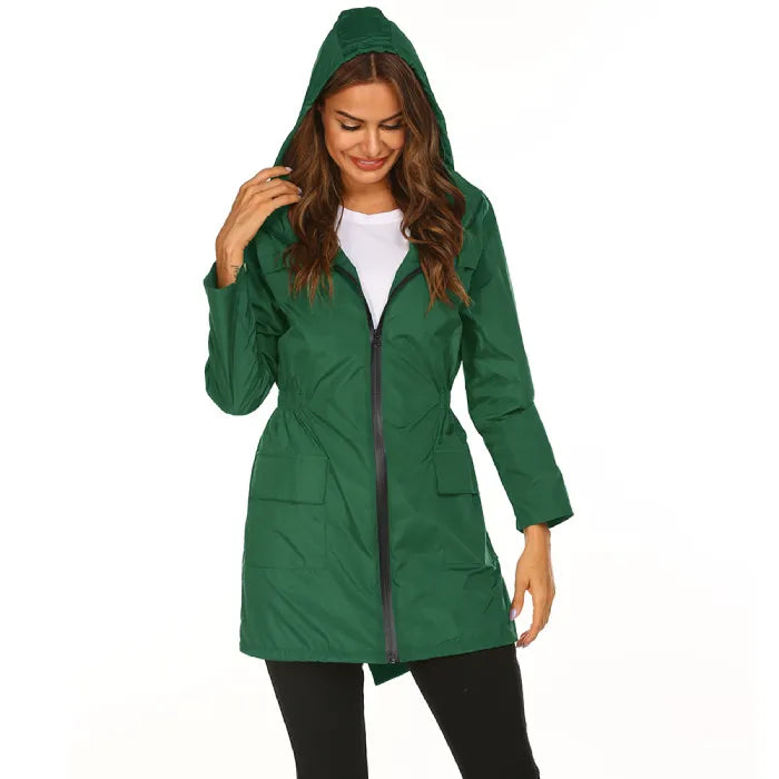 Womens raincoat in green featuring a hood and full-length zipper.